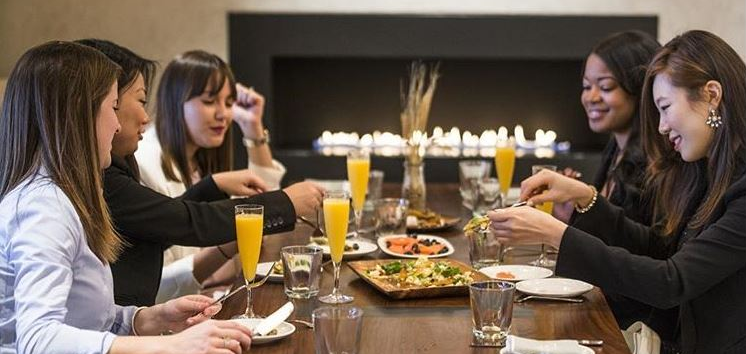 professionals enjoying drinks and appetizers